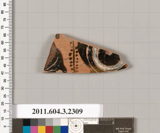 Terracotta fragment of a kylix: eye-cup (drinking cup)