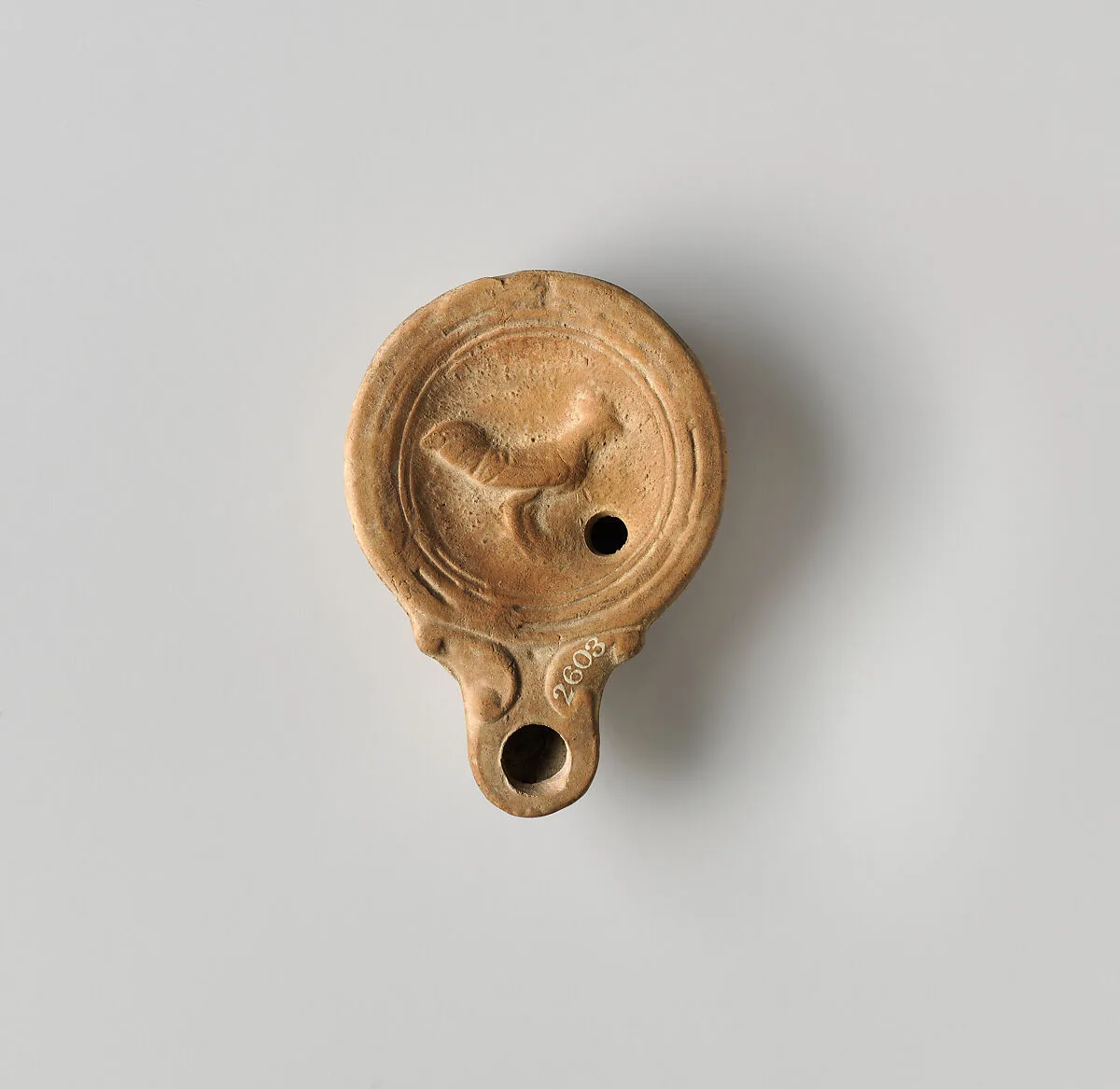 Terracotta oil lamp — Unknown