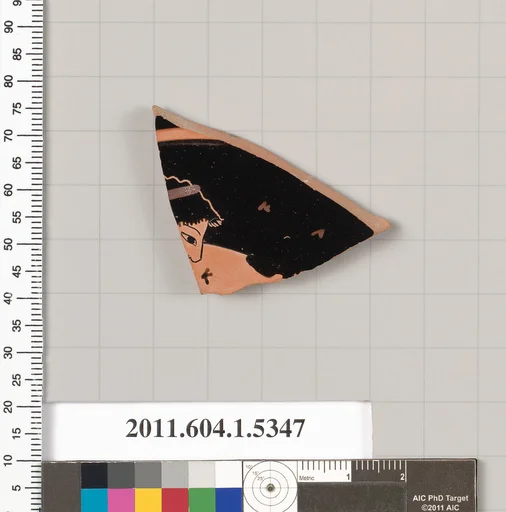 Terracotta fragment of a kylix (drinking cup)