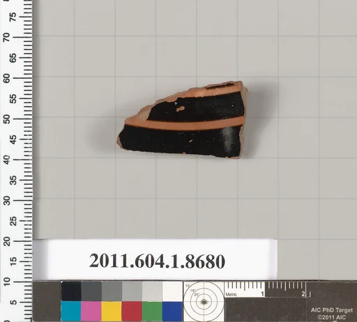 Terracotta fragment of a stemless kylix (drinking cup)