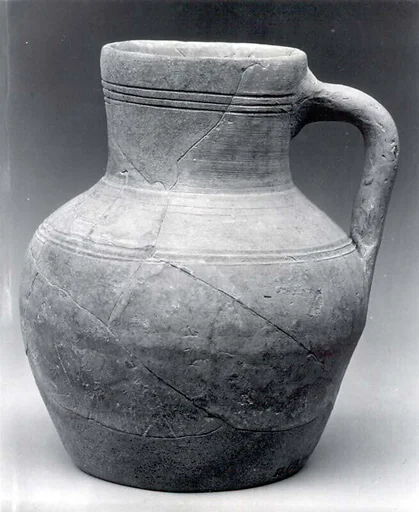 Jug with handle