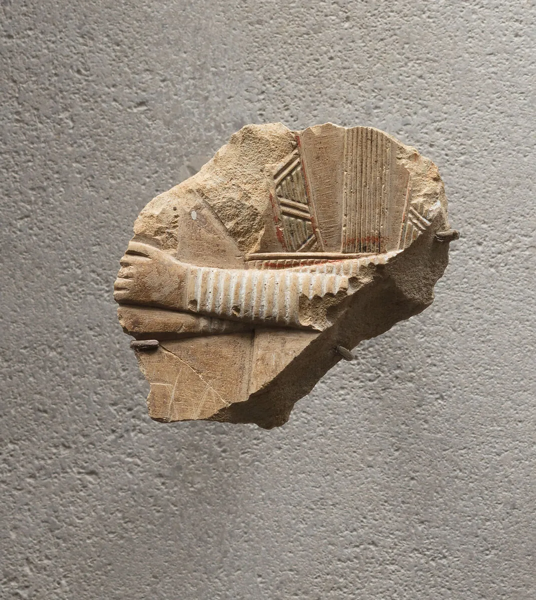 Relief of part of a richly adorned female figure - see 26.3.353-3 — Unknown