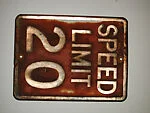 [Rusted Metal Sign: "Speed Limit 20"]