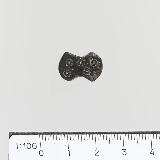 Steatite seal in the form of a double-axe