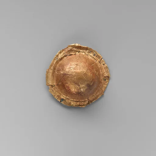 Gold roundel of bulbous form