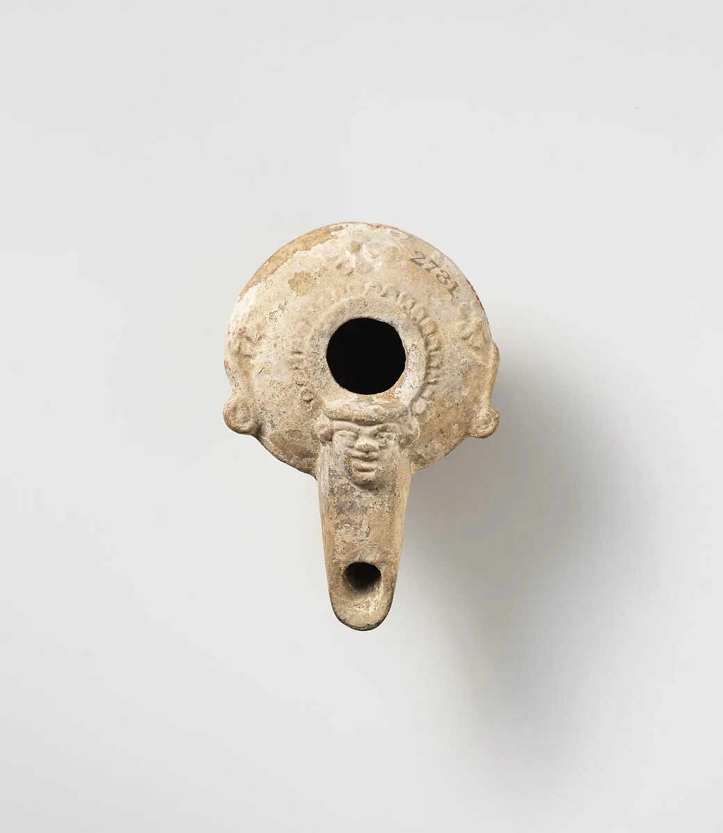 Terracotta oil lamp — Unknown