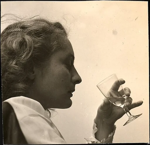 [Eleanor Clark Drinking, on Roof of 441 East 92nd Street Apartment Building, New York City]