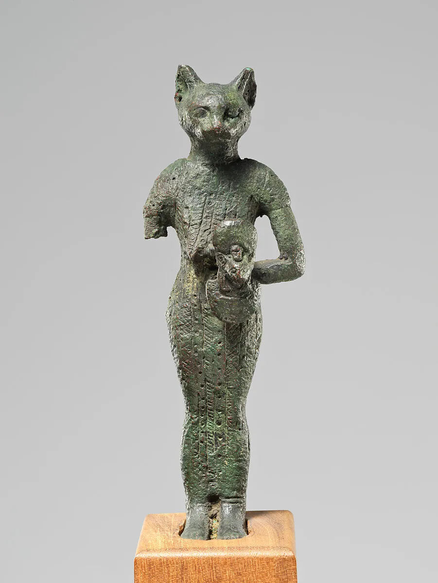 Bastet holding aegis and basket — Unknown