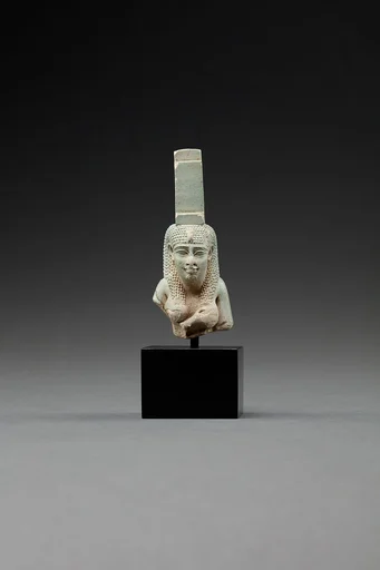 Upper part of a figure of Isis nursing Horus