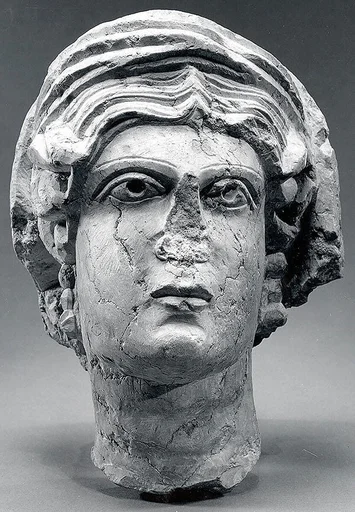 Marble female head from a relief
