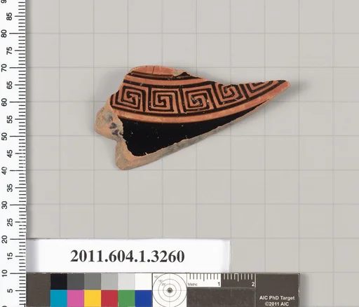 Terracotta fragment of a kylix (drinking cup)