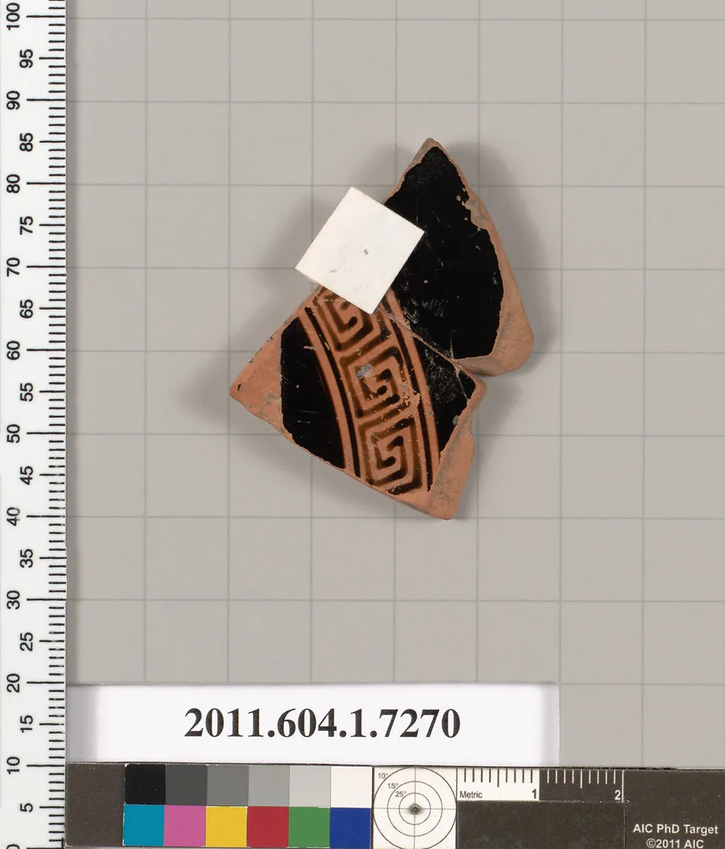 Terracotta fragment of a kylix (drinking cup) — Makron