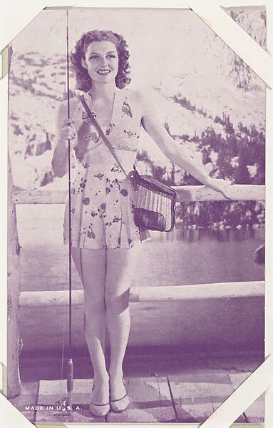 Actress holding fishing pole (W423) — Unknown