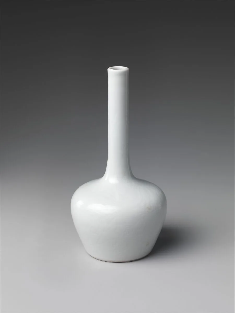 清雍正 景德鎮窯白釉暗花雲龍紋細頸瓶|Vase with decoration of dragons among clouds (one of a pair) — Unknown