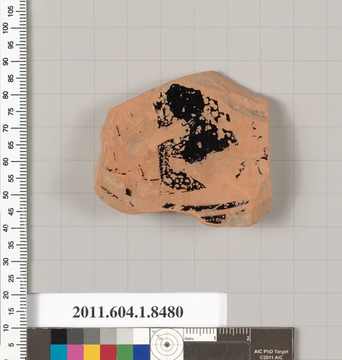 Terracotta fragment of a stemless kylix (drinking cup)