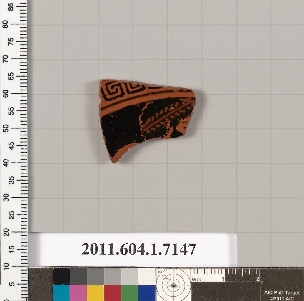 Terracotta fragment of a kylix (drinking cup) — Makron