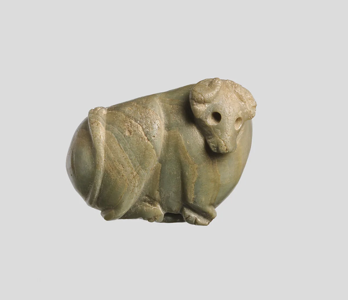 Seal amulet in the form of a reclining cow — Unknown