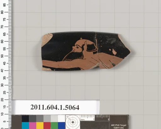 Terracotta rim fragment of a kylix (drinking cup)