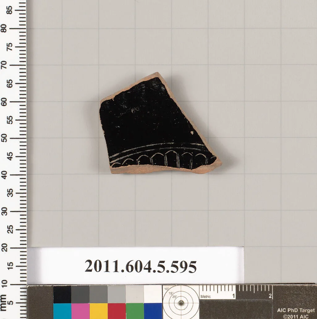Terracotta fragment of a stemless kylix (drinking cup) — Unknown