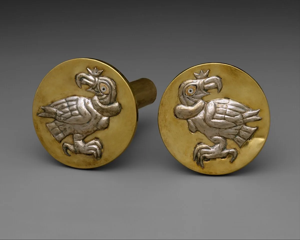 Pair of earflares with condors — Unknown