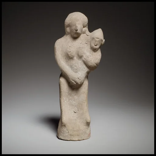 Seated female figurine holding a baby