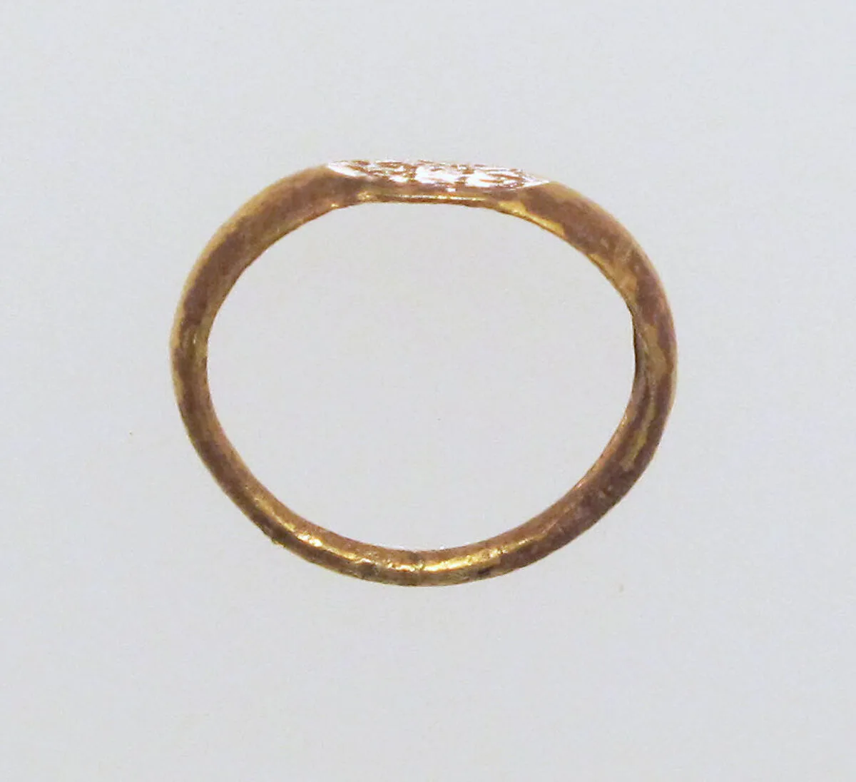 Gold ring with inscribed bezel — Unknown