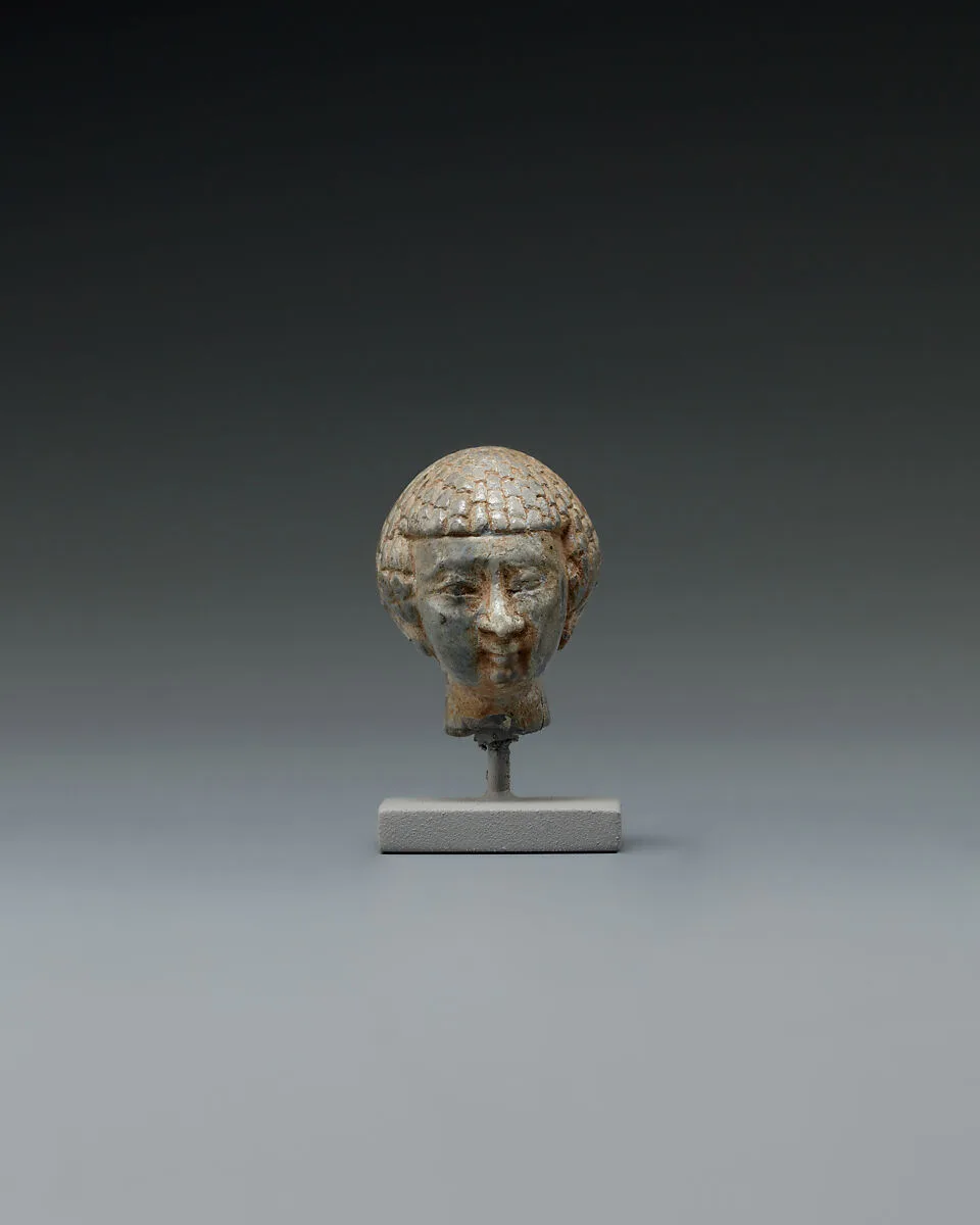 Head from a Statuette — Unknown