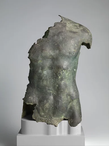 Bronze torso of a youth