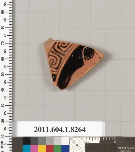 Terracotta fragment of a kylix (drinking cup)