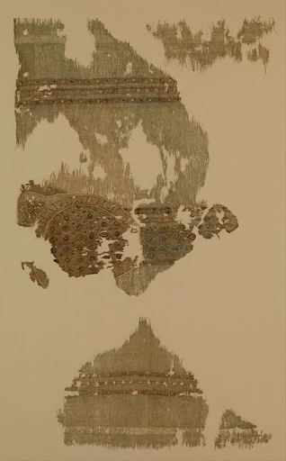 Portion of a Garment with Geometric Patterns