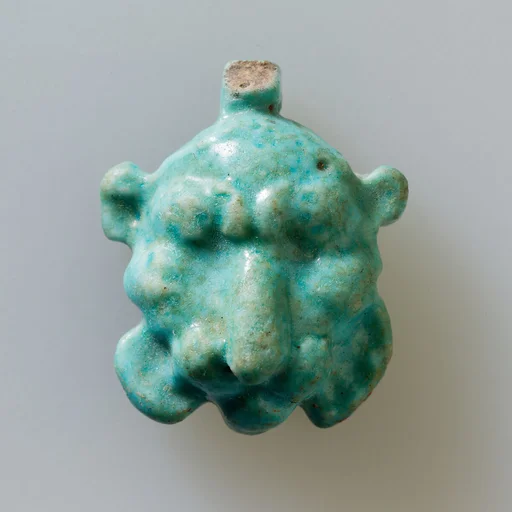 Lion head amulet