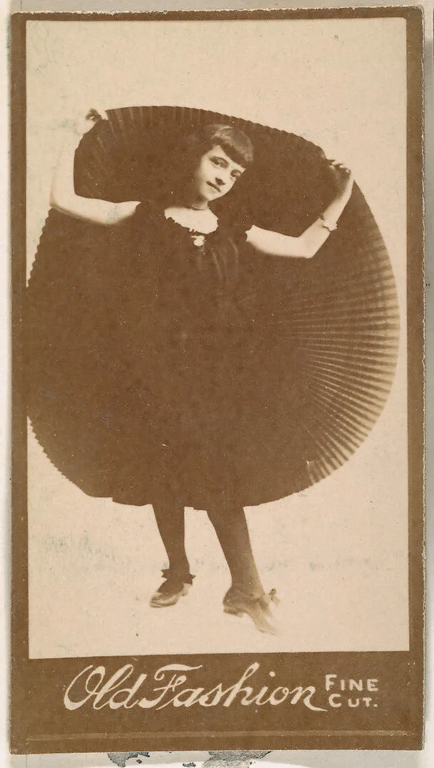 Actress holding up portion of pleated skirt, from the Actresses series (N664) promoting Old Fashion Fine Cut Tobacco — Unknown