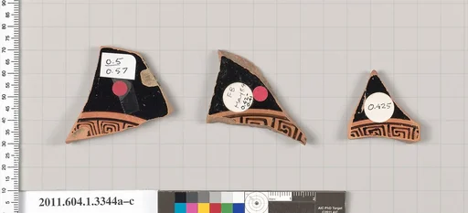 Terracotta fragments of kylikes (drinking cups)
