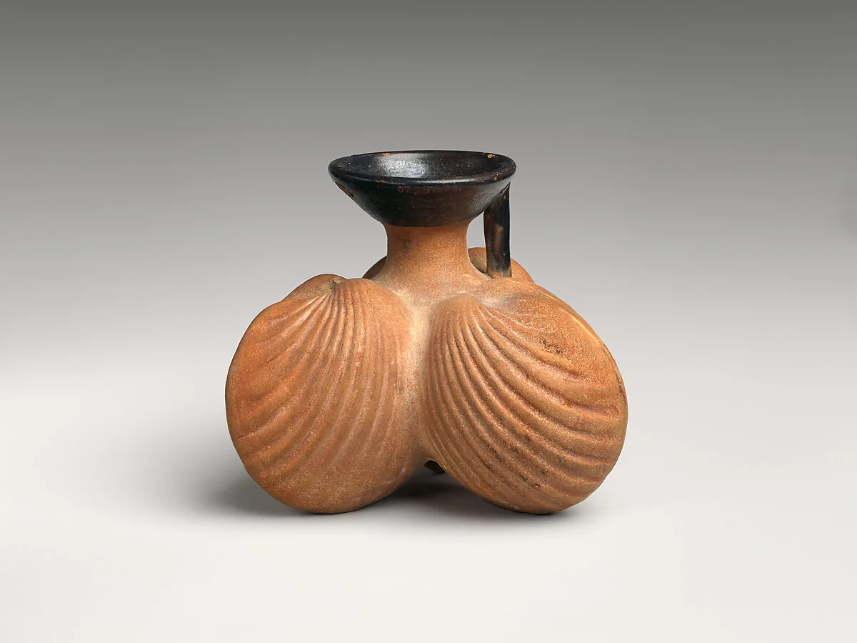 Terracotta aryballos (oil flask) in the form of three cockleshells — Unknown