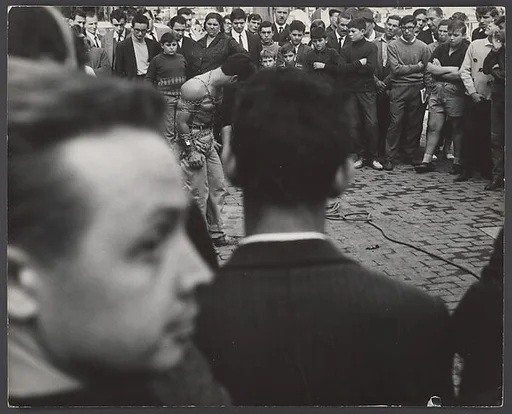 [Crowd Scene with Young Man in Chains, Portugal?]