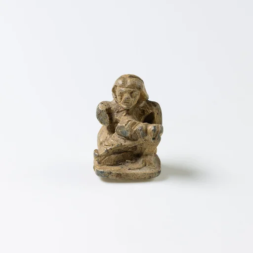 Design Amulet, Back in the Form of a Woman Suckling a Child, Device showing Two Lizards Head-to-tail