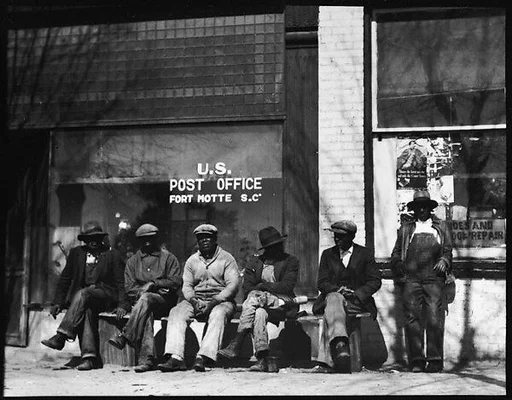 [Men Seated on Bench in Front of Post Office, Fort Motte, South Carolina]