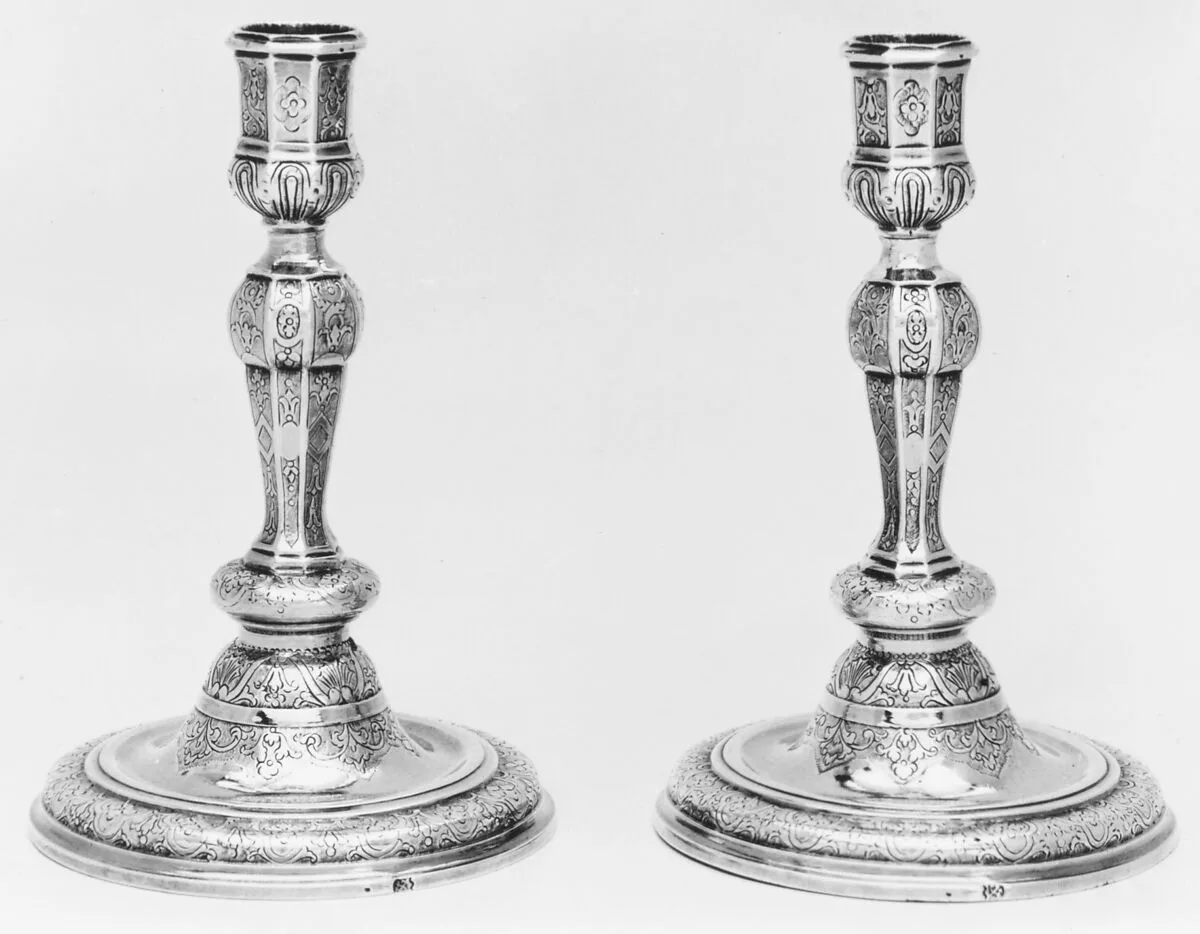 Pair of candlesticks — N.H. (?)