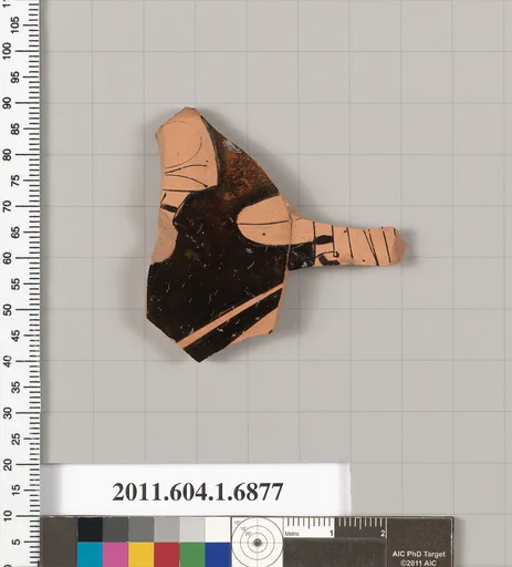 Terracotta fragment of a kylix (drinking cup)