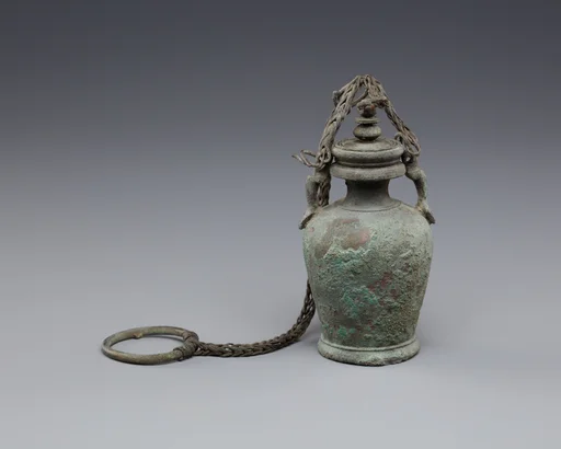 Bottle with stopper and suspension ring, possibly intended for unguent