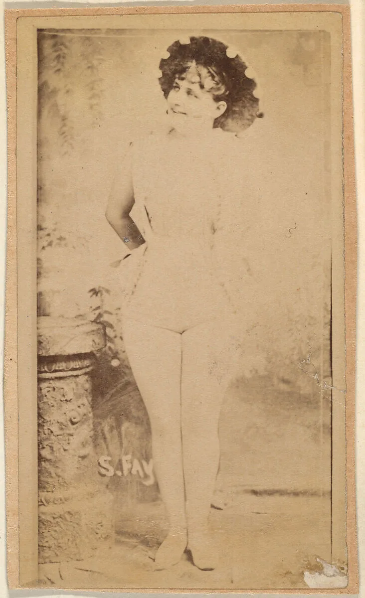 Actress wearing brimmed hat with pompoms, from the Actresses series (N668) — Unknown