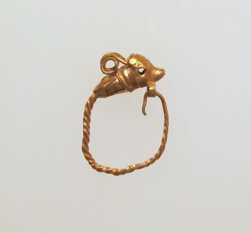 Gold earring with head of a dolphin
