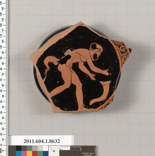Terracotta fragment of a stemless kylix (drinking cup)
