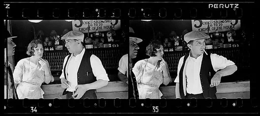 [Two 35mm Film Frames: People Talking at Amusement Park Shooting Gallery]