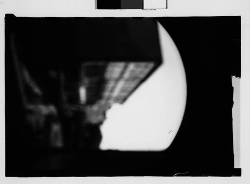 [Blurred View of Waterfront Buildings and Footbridges, from Under Arch, Savannah, Georgia]