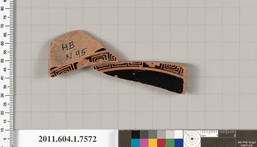 Terracotta fragment of a kylix (drinking cup)