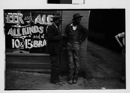 [Two 35mm Film Frames: Two Men in Front of Liquor Store Window, Georgia]