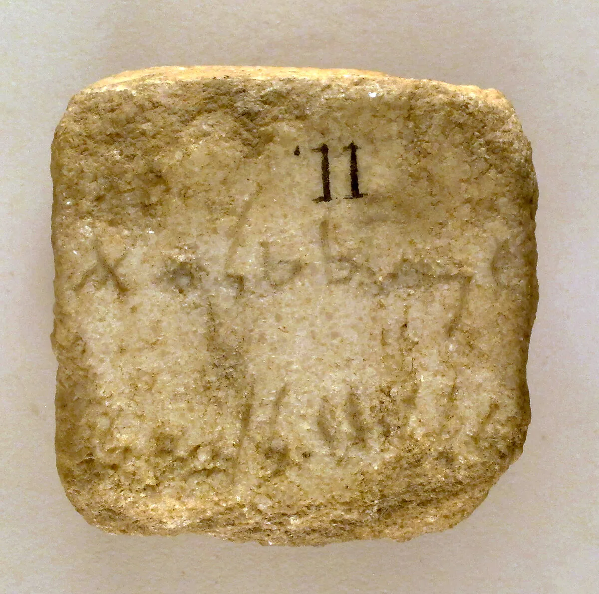 Marble cippus fragment with Phoenician inscription — Unknown