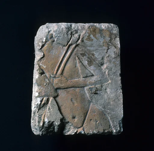 Relief with torso of a guard