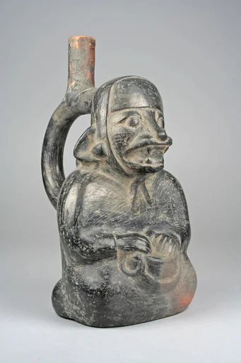 Stirrup Spout Bottle with Seated Figure